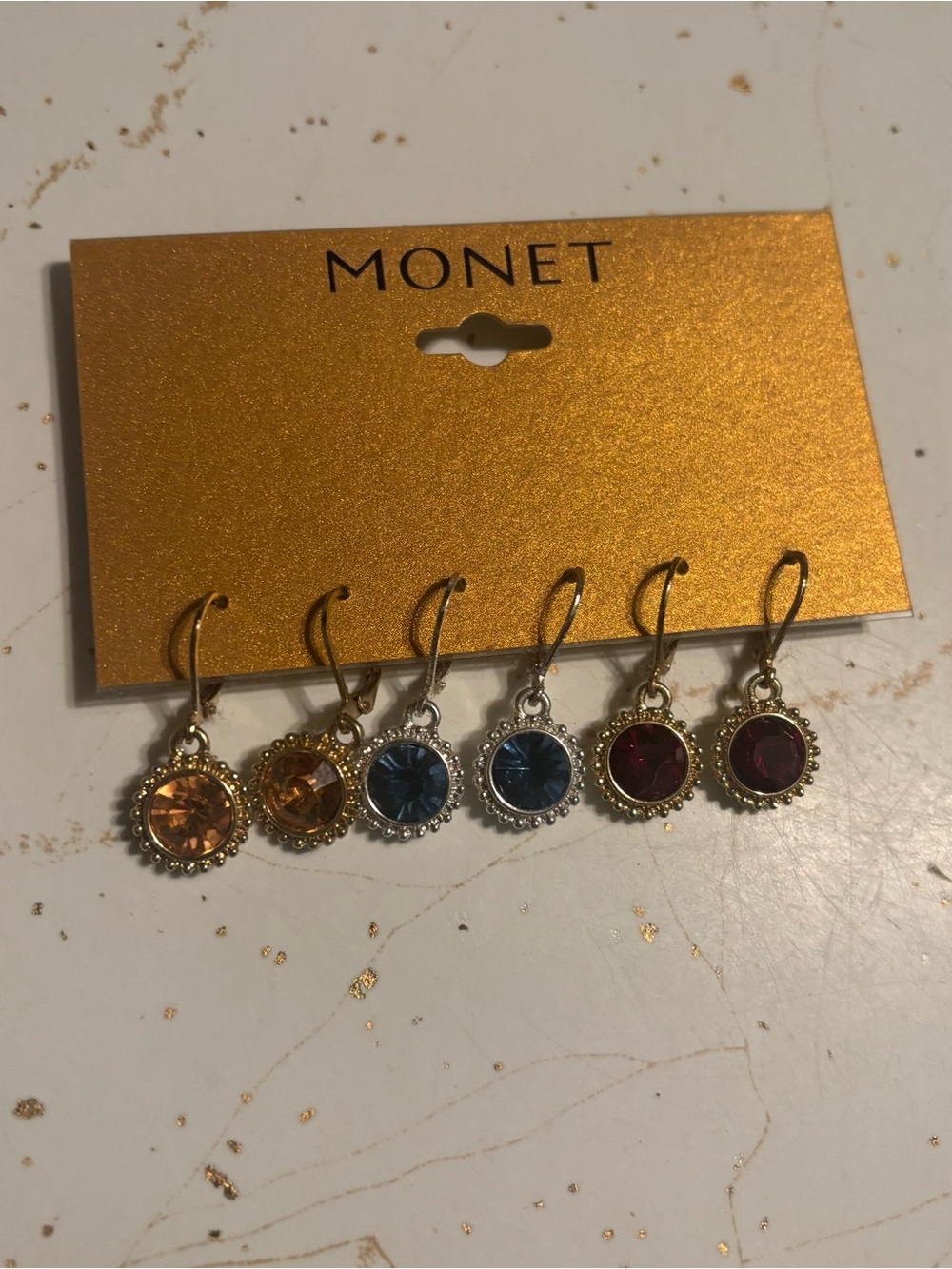 Dangle Earrings and multiple colored stud earrings